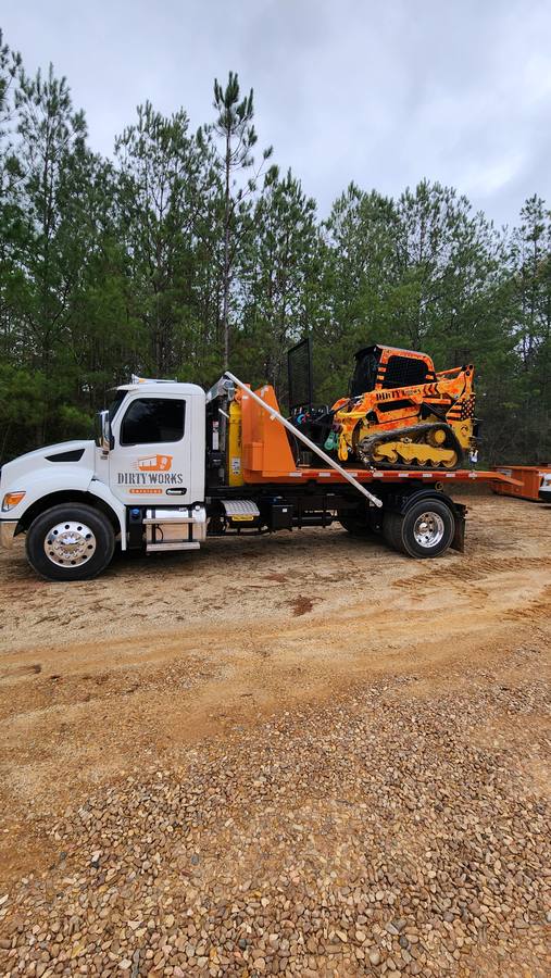 Service truck with skid steer