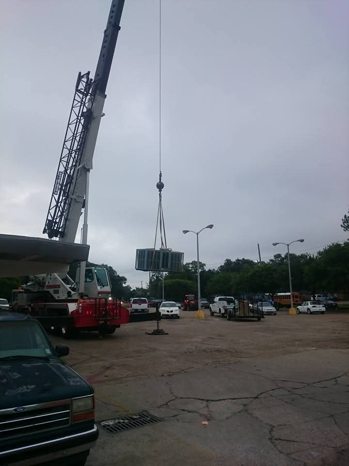 RTU crane lift wide shot