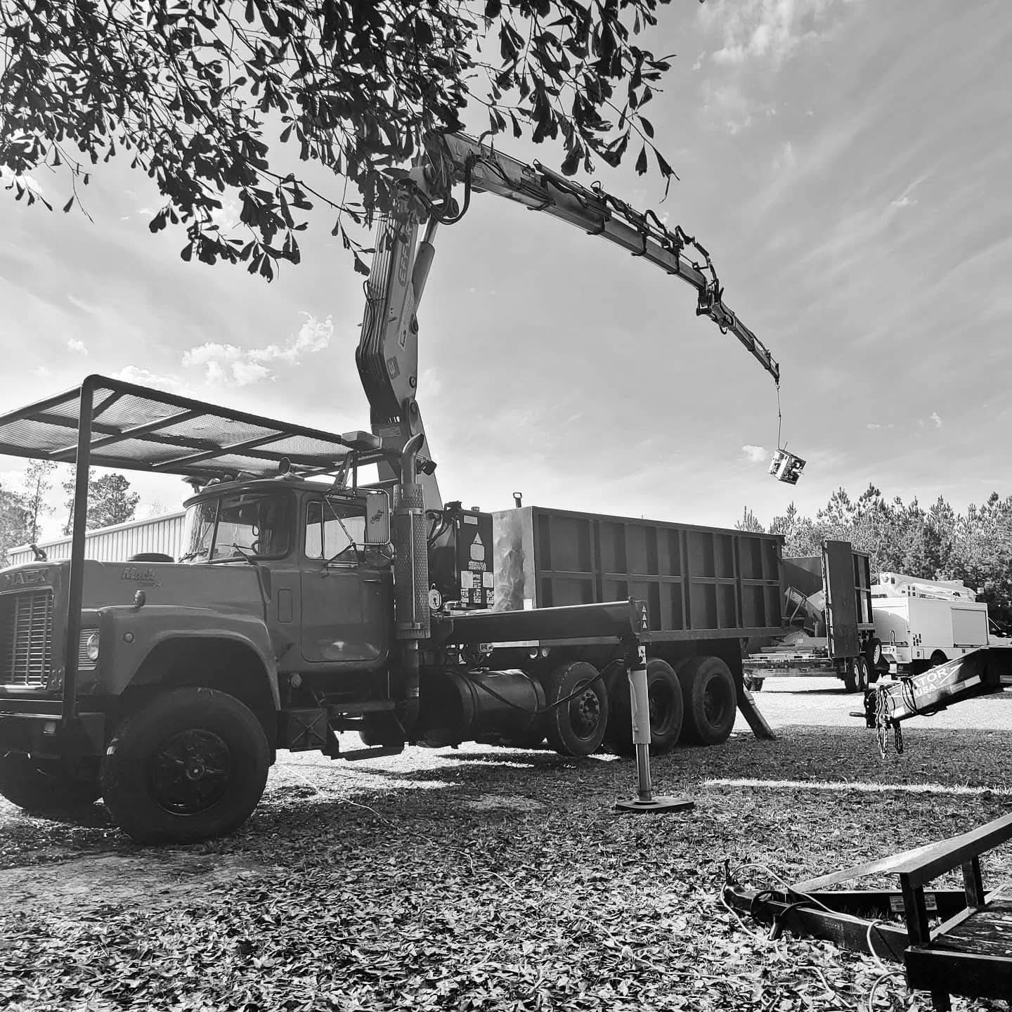 Mack truck with knuckle boom crane