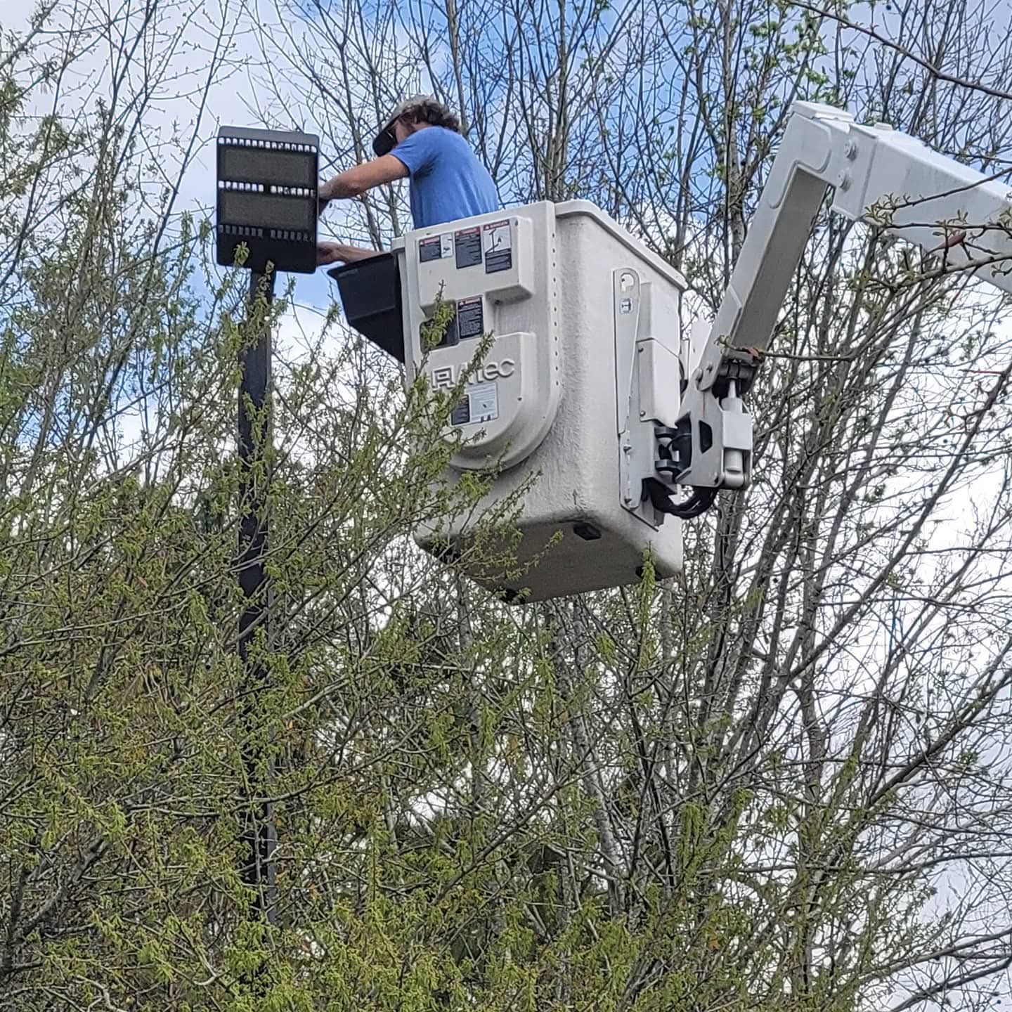 Altec bucket truck LED flood install on pole