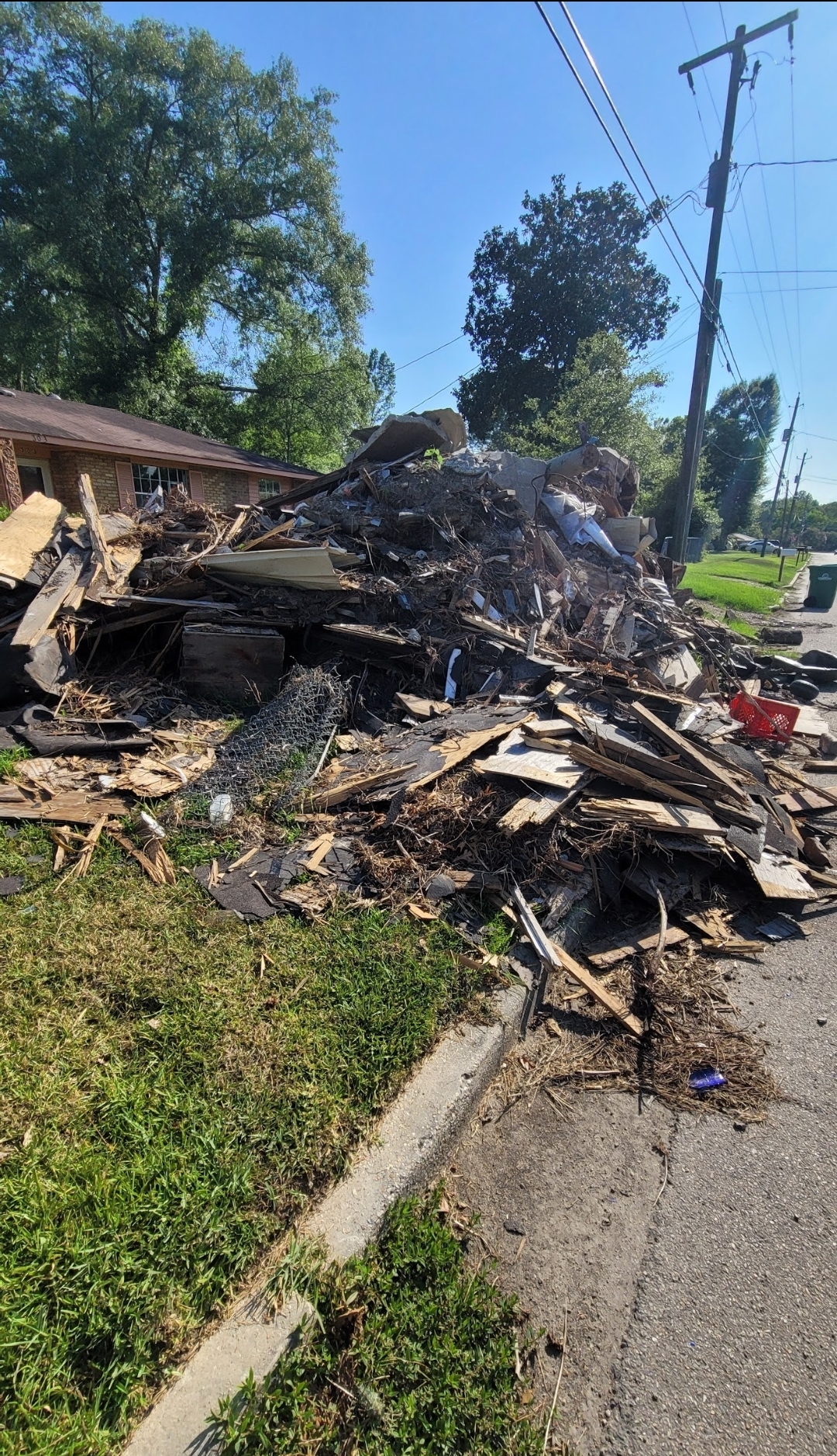 Flood debris pile at curb