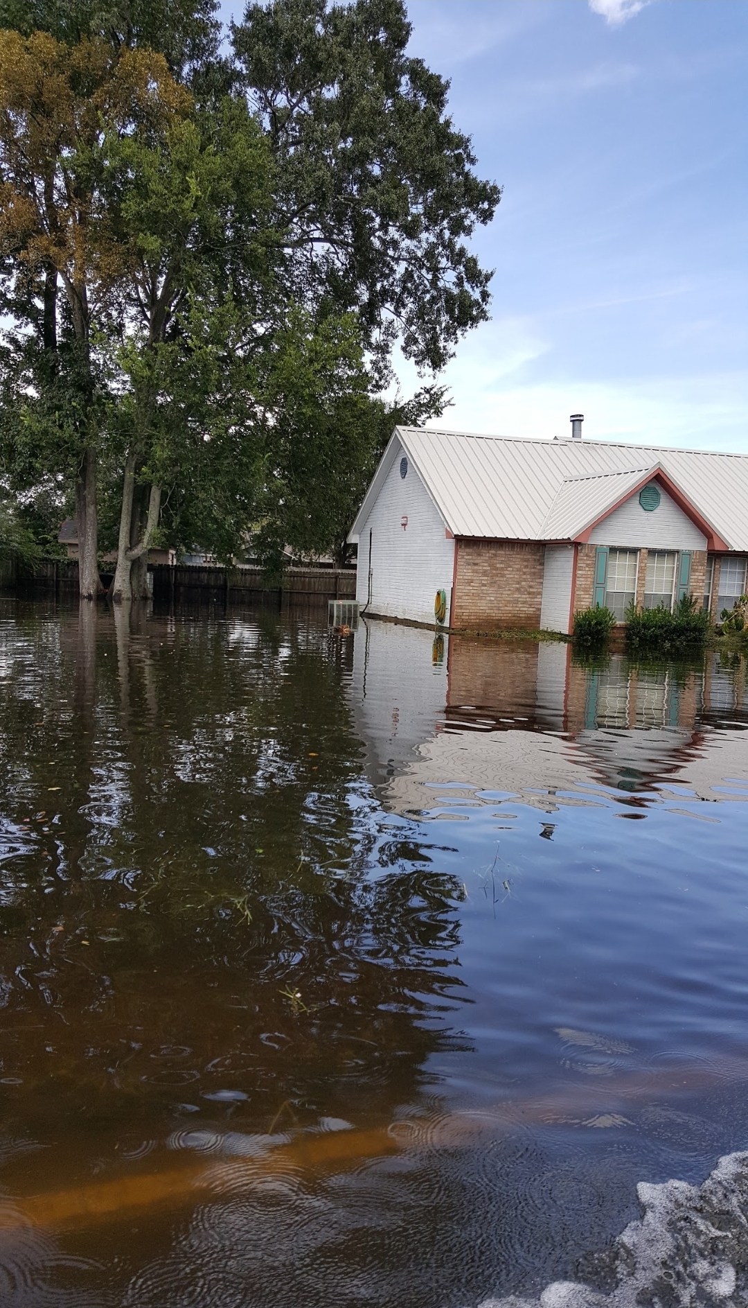 House surrounded by floodwater